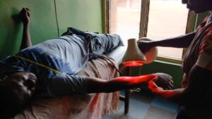 victim of the auto crash at the enugu-onitsha expressway receiving treatment 